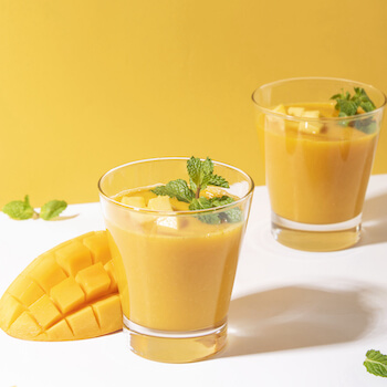 Mango Lassi - Traditional Indian Yougurt based drink Recipe.